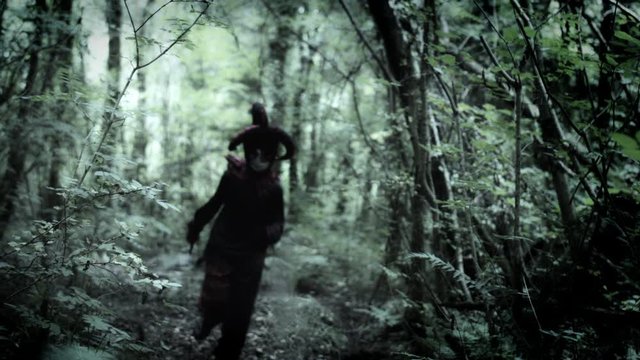 4k Halloween Shot of a Child in Joker Costume Running to Camera