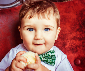 beautiful portrait of cute and little boy with bowtie