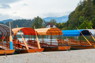 Lake Bled and the island with the church at autumn color at sunset in Slovenia