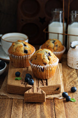Freshly baked blueberry muffins in a rustic setting