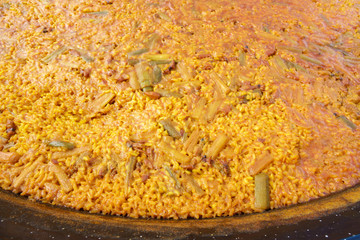 Typical valencian paella in traditional pan