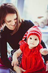 The mother hold hands her daughter