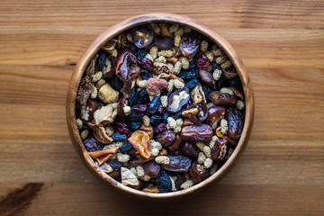 Dried Fruit (Walnut, fig, palm, mulberry, date) in a wooden bowl