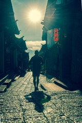 Morning running in Old Town of Lijiang, Yunnan, China.