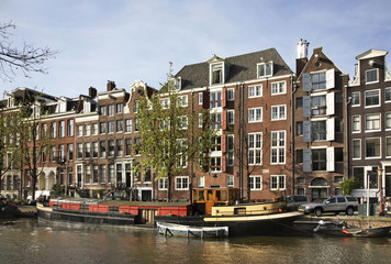 Naklejka premium Canal in Amsterdam. Netherlands