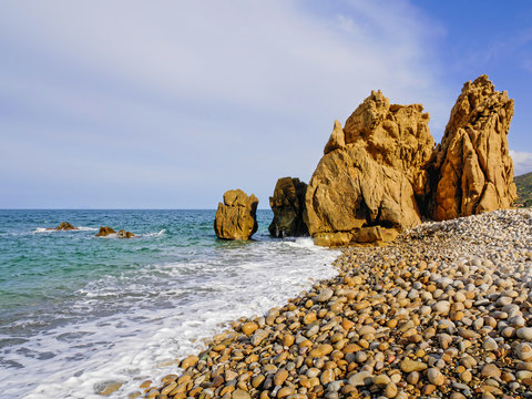 Panoramic view of nice colorful huge cliff and sea, Castel di Tusa, Sicily, Italy.