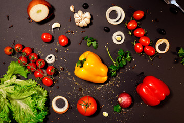 Fototapeta na wymiar vegetables on a dark background
