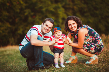 Fototapeta premium wonderful portrait of beautiful and happy parents with their cut