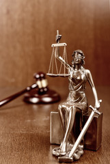 Statue of justice and Wooden gavel, law concept