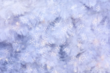 Abstract winter background with snow flakes falling.