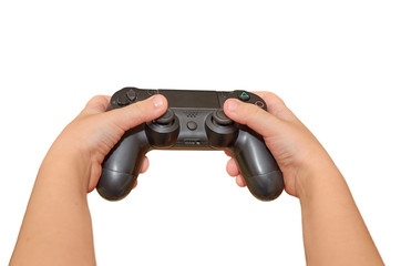 Children's hands holding a remote gaming consoles