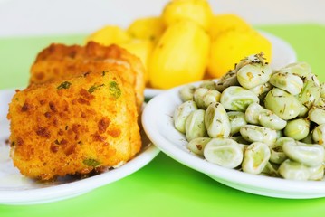 Fried fish fillet ,herb, broad bean, potato.