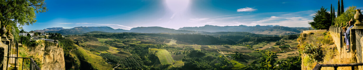 Panorama from the nature of Ronda with a low shining Sun, Andalusia, Spain 