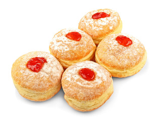 Obraz na płótnie Canvas Tasty donuts with jam on white background. Hanukkah celebration concept