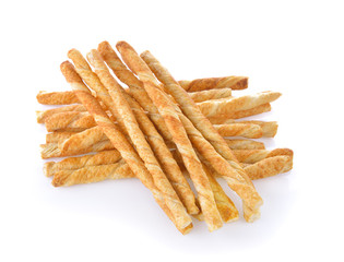 pile of delicious pretzel sticks isolated on white background