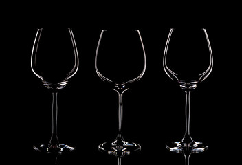 3 Bohemian crystal glasses, isolated on a black background, shooting in the studio