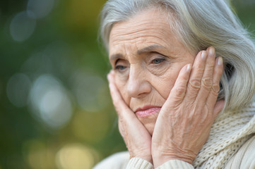 Sad elderly woman close-up