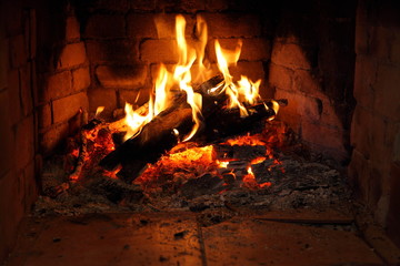 fireplace with burning firewood/ fireplace with burning firewood
