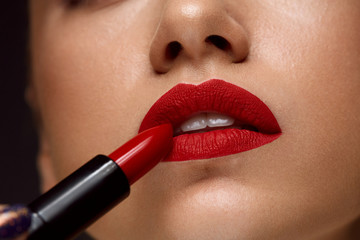 Red Lipstick. Closeup Of Woman Face With Bright Lips Makeup © puhhha