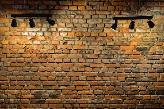 Old brick wall with stage lights