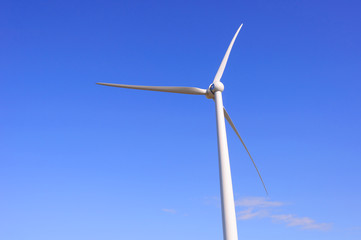 Huge windmill station with blue sky background