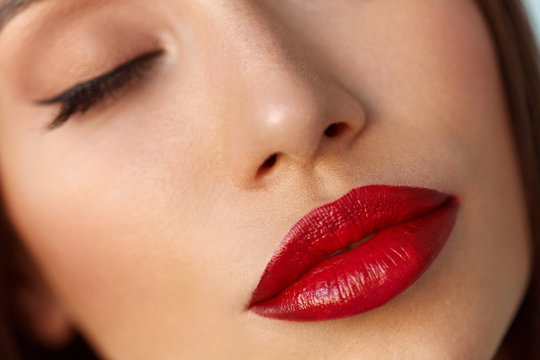 Beauty Woman Face With Beautiful Makeup And Sexy Red Lips