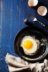 Fried egg in a cast-iron skillet