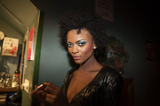 Portrait of young woman in nightclub