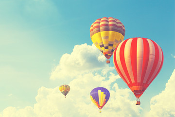 Fototapeta premium Hot air balloon on sun sky with cloud, vintage and retro instagram filter effect style
