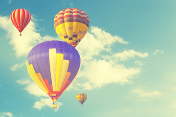 Hot air balloon on sun sky with cloud, vintage and retro instagram filter effect style