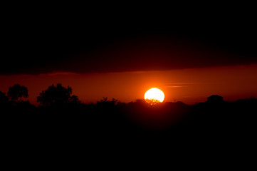 Panorama of Amazing Beautiful Sunset Sunrise Over Dark Landscape Silhouette