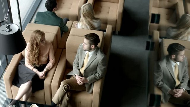 Group of business people having a chat at a café. 
