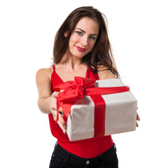 Fototapeta premium Pretty young girl holding a gift