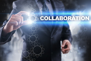 Businessman selecting collaboration on virtual screen.