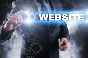 Fototapeta na wymiar Businessman selecting website on virtual screen.