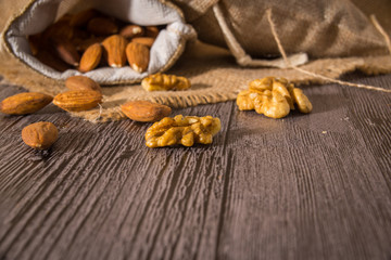 Nuts on wooden background