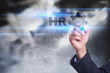 Businessman is drawing on virtual screen. hr concept