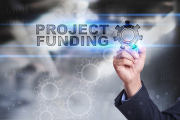 Businessman is drawing on virtual screen. project funding concept