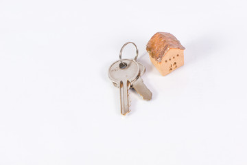 House and keyring,  invesment and realestate concept