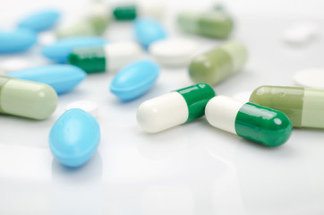 Blue and green pills
