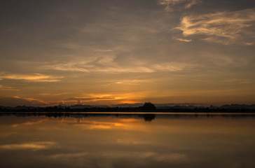 Fototapeta na wymiar Sunset at Nong Chik Reservoir Petchaburi, Thailand