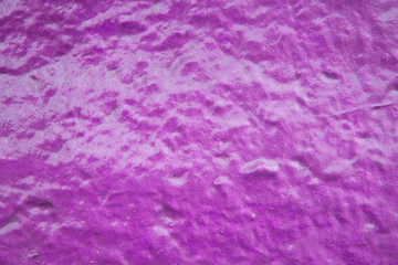 Rough purple and red painted on cement wall and floor texture ba