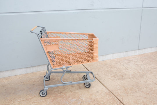 Shopping cart with orange basket