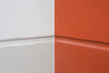 orange and white painted on cement