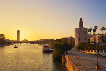 Fototapeta premium Seville sunset skyline torre del Oro in Sevilla