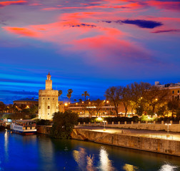 Fototapeta premium Seville sunset skyline torre del Oro in Sevilla