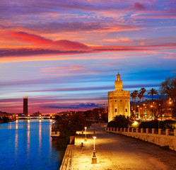 Fototapeta premium Seville sunset skyline torre del Oro in Sevilla
