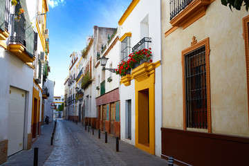 Fototapeta na wymiar Triana barrio Seville facades Andalusia Spain