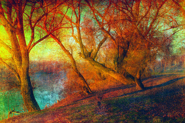 Fototapeta na wymiar Art grunge landscape showing trees at river shore at dusk.