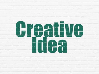 Business concept: Creative Idea on wall background